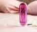 An intimate lubricant for comfortable sex close-up on a colored background. High quality photo